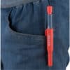 A red Extol pencil-marker clipped to blue jean pockets.
