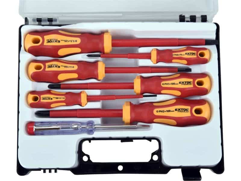 A plastic case with six insulated screwdrivers and a test screwdriver, all arranged neatly in molded slots.